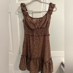 women’s brown and white polka dot dress